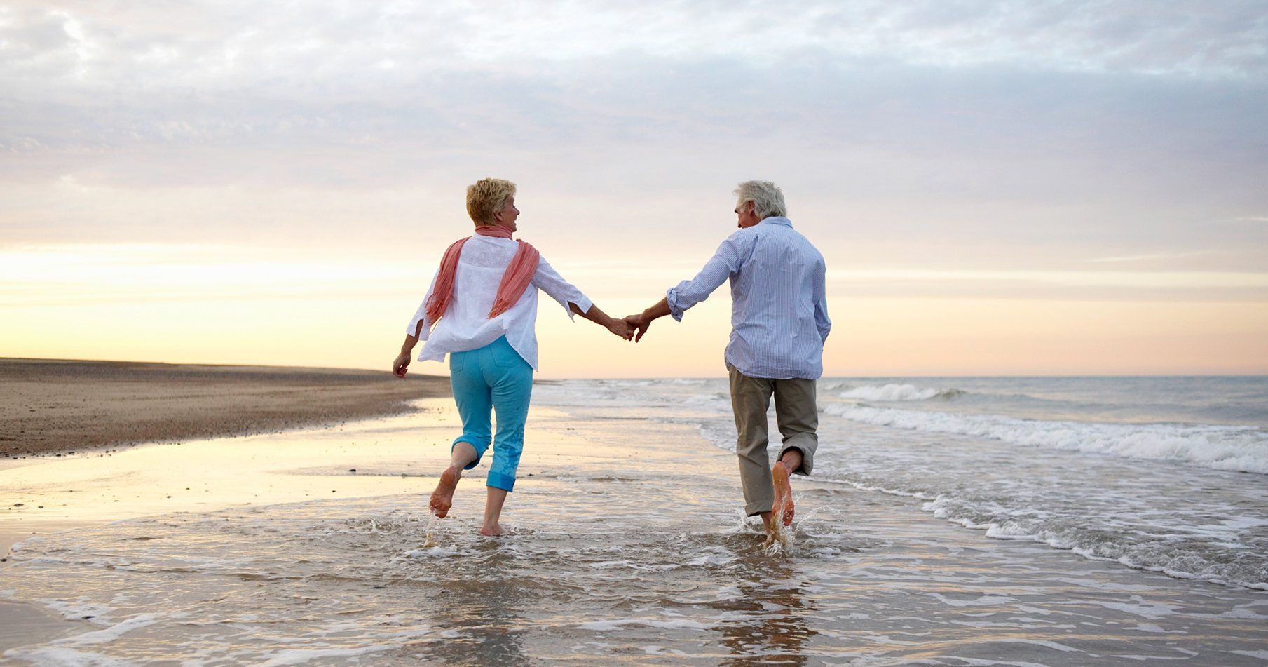 Older couple walking outdoors together